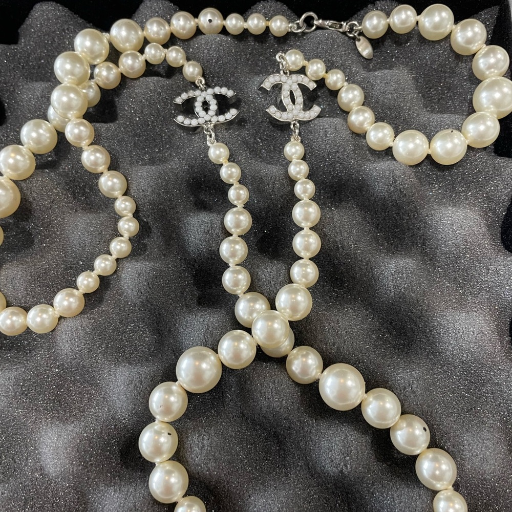 Chanel 2 Gold CC White
Bead Pearl Necklace, with original box.
